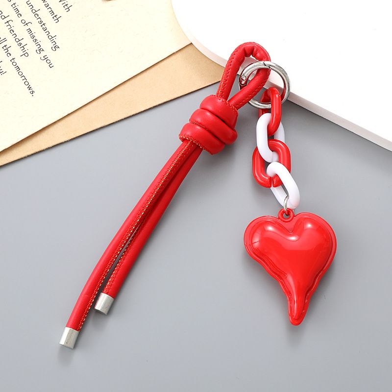 Porte-clés en cuir PU avec pendentif en forme de cœur, accessoire de décoration polyvalent pour sac à main en corde tissée, fait à la main, pour femmes_voghion.com