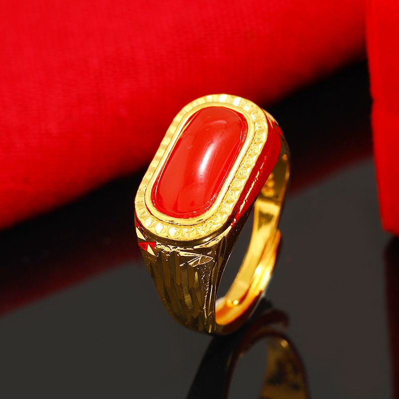 Live-Übertragung des offenen Mundes eines Mannes, Ring mit vergoldetem Messingschmuck_voghion.com