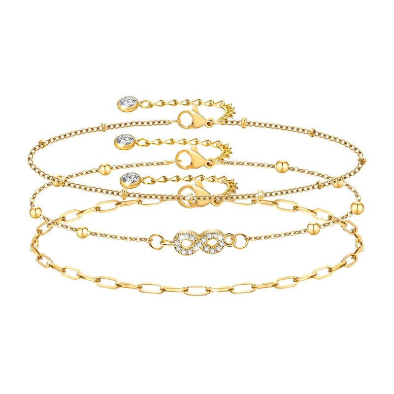 Cavigliera con perline a forma di croce con infinito, figura a otto, intarsiata in zirconia cubica, graffetta in acciaio inossidabile_voghion.com