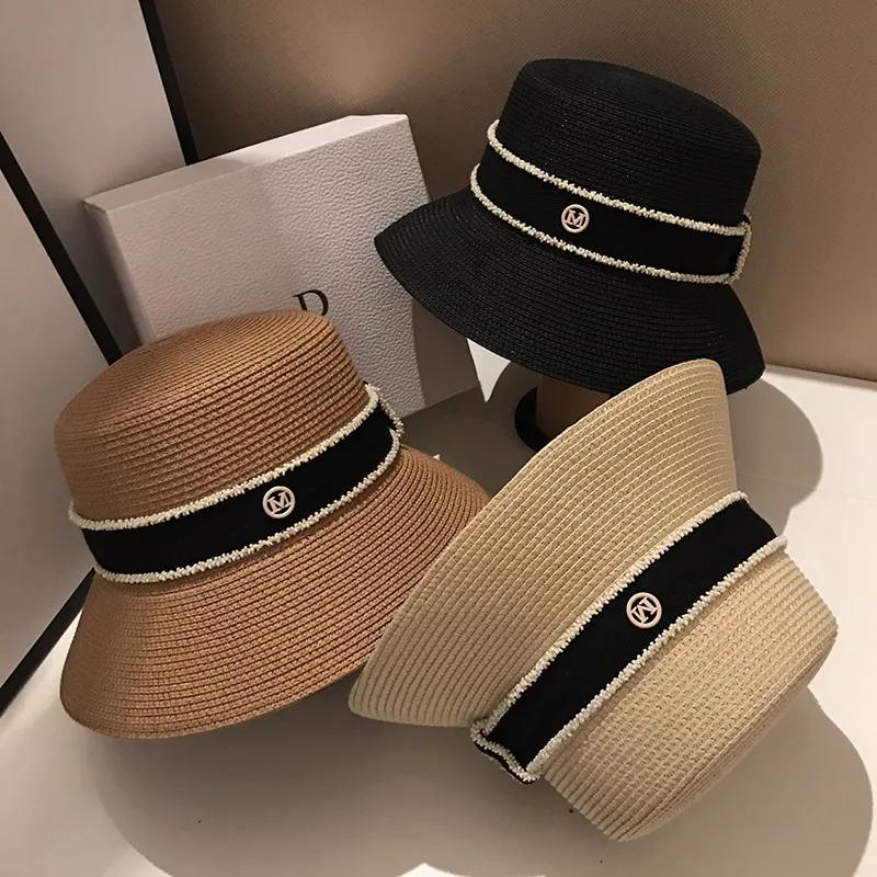 Gorąca sprzedaż Gorąca sprzedaż Nowe letnie słomkowe kapelusze przeciwsłoneczne dla kobiet Moda damska Płaskie rondo Wstążka Plażowa Czapka podróżna Chapeau Femme Kapelusz typu Bucket_voghion.com