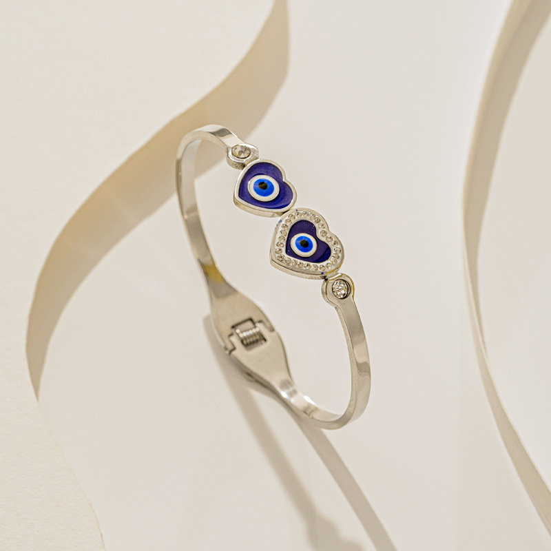 Bracciale a forma di stella gocciolante di olio per occhi rotondi da donna in gioielli con bracciale in acciaio al titanio a molla fresca_voghion.com