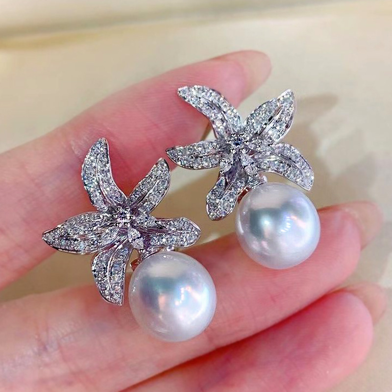 Orecchini di perle calde di Cao Shi Simpatici orecchini di zirconi a stella marina con orecchini a stella di temperamento principessa_voghion.com