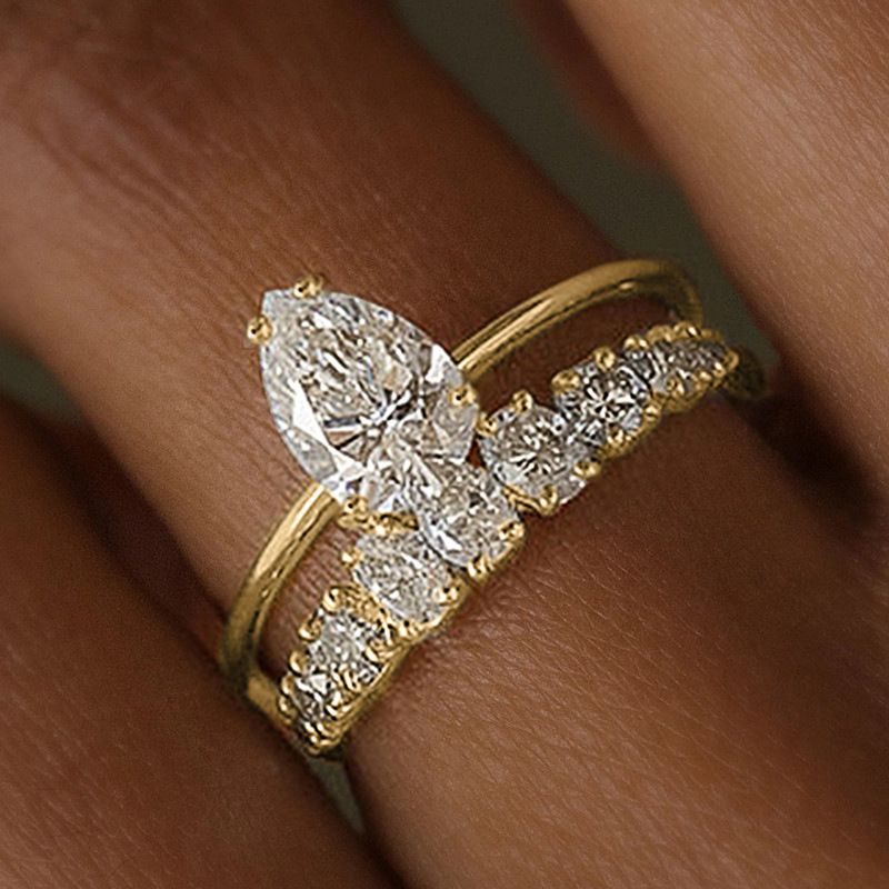 L'anello in zircone a forma di lacrima di Cao Shi è alla moda e squisito, adatto per anelli di fidanzamento e anelli popolari._voghion.com