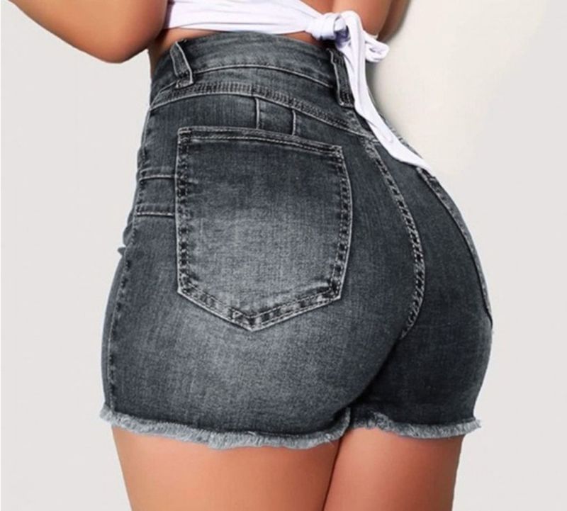 Pantaloncini in denim elasticizzati con frange usurate, vestibilità slim, per donna_voghion.com