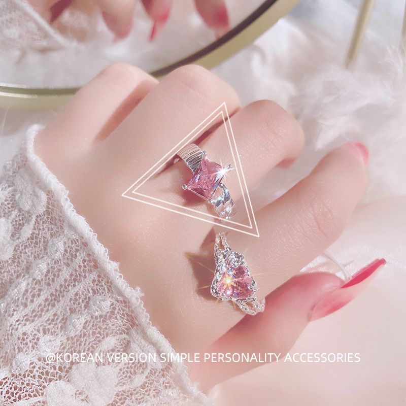Anillo de nicho de lujo con circonitas abiertas para mujer, con forma de corazón irregular y diamantes rosas, estilo frío y personalidad._voghion.com