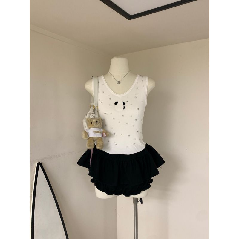 Pull sans manches parfumé à clous, nouveau style d'été 2025, coupe ajustée, haut tricoté polyvalent pour femmes_voghion.com