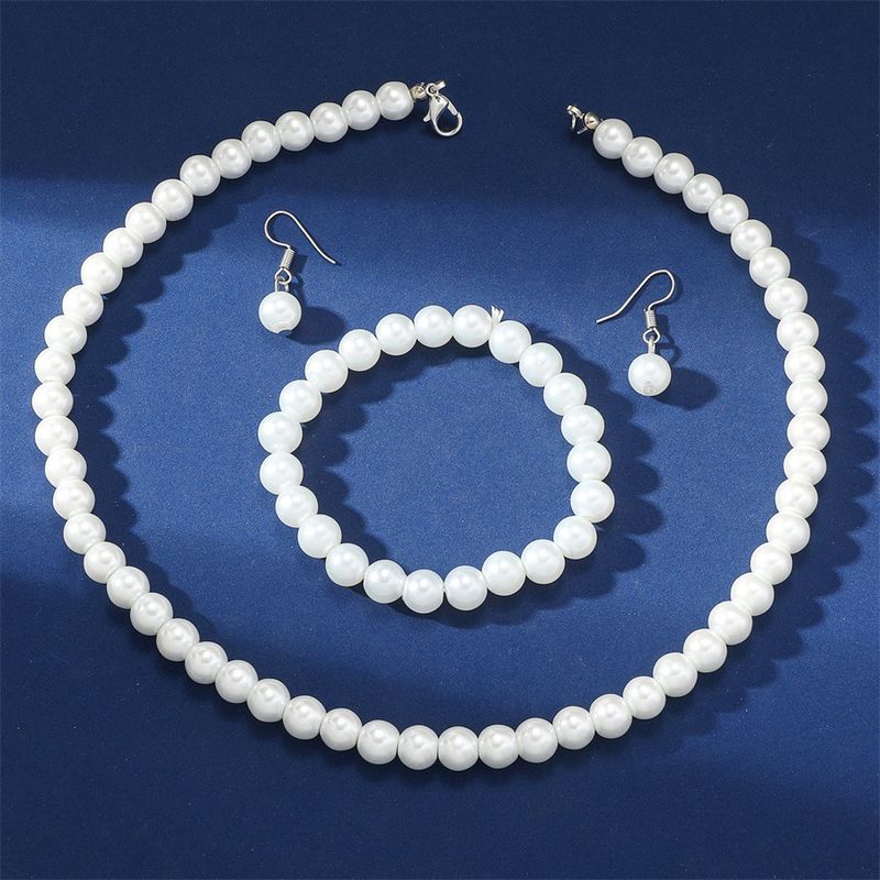 2023 Nuova catena sposa gioielli di perle set di tre pezzi braccialetto orecchini collana corta clavicola_voghion.com
