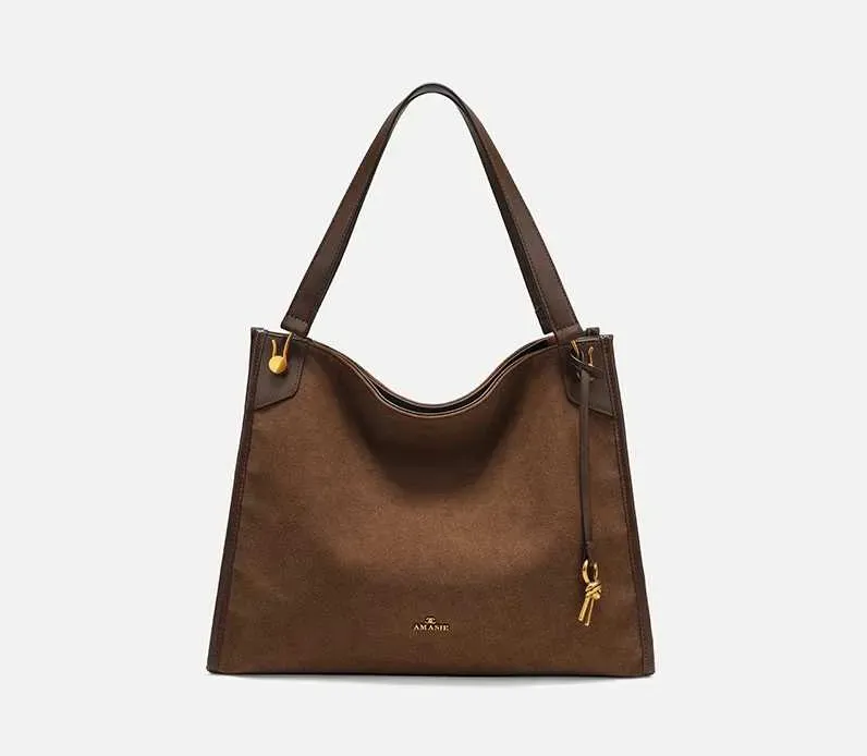 Borsa a secchiello in pelle nuova e versatile COCIO, design di nicchia, borsa da donna moderna e di grande vendita_voghion.com