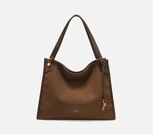 Borsa a secchiello in pelle nuova e versatile COCIO, design di nicchia, borsa da donna moderna e di grande vendita_voghion.com