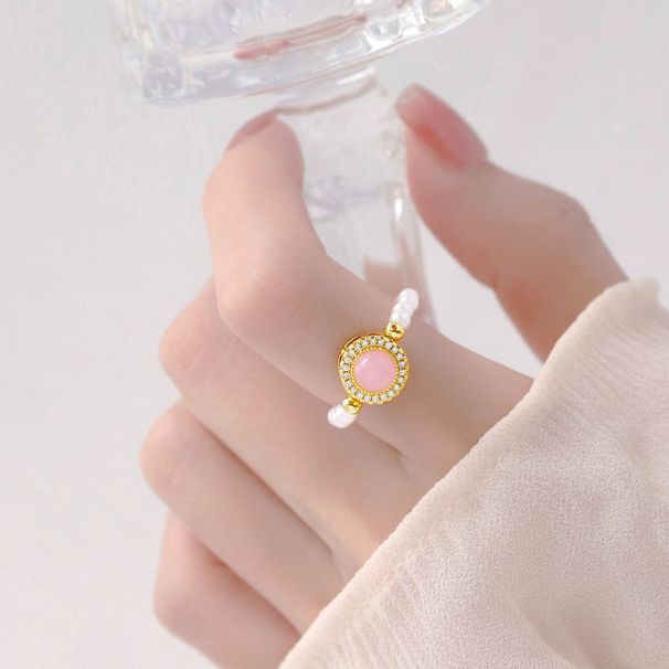 2024 Nuovo anello in pietra di polvere Piccola esplosione di patate dolci Anello elastico con perla ad alto valore cromatico Design di nicchia_voghion.com