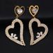 Orecchini pendenti a cuore cavo con zirconi di nuova moda orecchini da donna con strass tutto-fiammifero carini orecchino 05_voghion.com