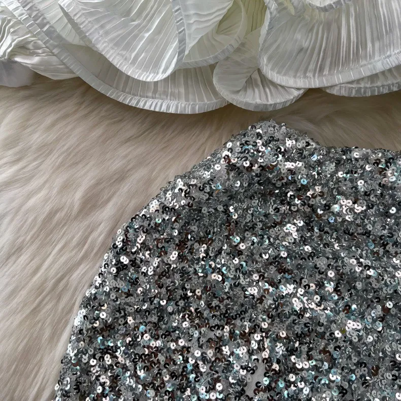 Vêtements pour femmes Costume à la mode, tempérament féminin, chemise brillante à manches longues et col en V avec ourlet en feuille de lotus pour femmes, jupe à paillettes taille haute_voghion.com