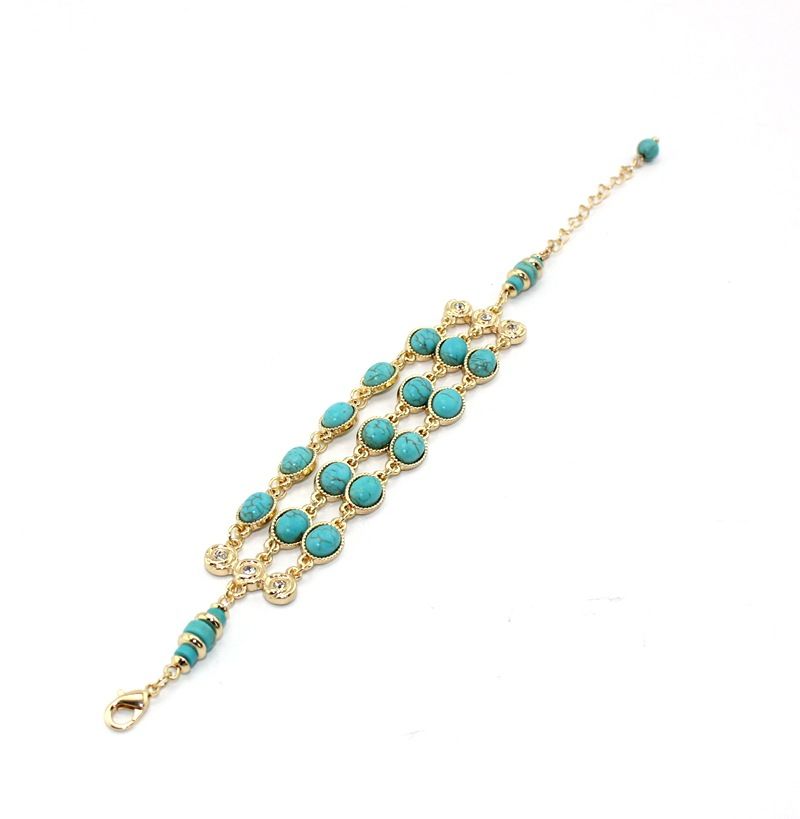Design e sviluppo di gioielli Wind con bracciale intarsiato di diamanti a tre file con texture turchese_voghion.com