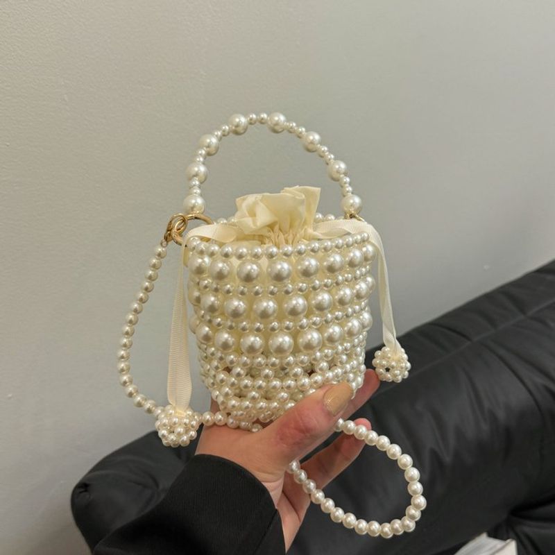 Pearl handbag 2024 new woven internet famous bead water bucket bag, trendy single shoulder crossbody bag_voghion.com