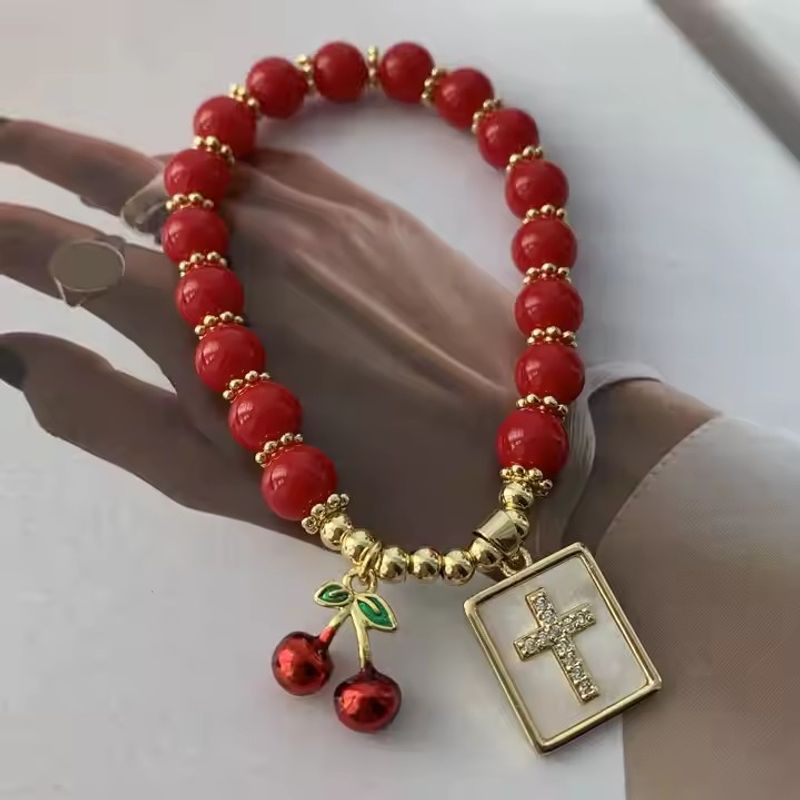 Eleganti romantici dolci a forma di cuore con zirconi a forma di croce e perle di conchiglia in rame con perline a catena e braccialetti all'ingrosso_voghion.com