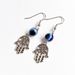 Orecchini vintage con ciondolo a forma di mano e occhio_voghion.com