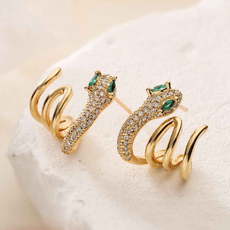 Orecchini di lusso Aogu Niche in rame placcato oro con zirconi a forma di serpente per donna, gioielli alla moda hip-hop_voghion.com