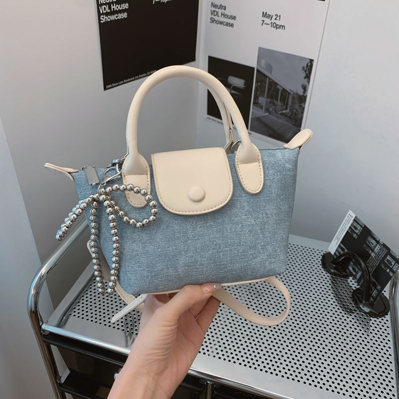 Bolso bandolera de un solo hombro versátil de moda para mujer con forma de bola de masa de fideos suaves de alta gama francesa, bolso de mano para ir a_voghion.com