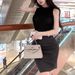 Elegant High-End Black Half-High Collar Halter Neck Tank Top And High-Waisted Short Skirt Two-Piece Set For Women_voghion.com