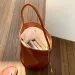 Summer New Soft Leather Bucket Handheld Niche Versatile Commuter Underarm Large Capacity Cylinder Shoulder Bag For Women_voghion.com