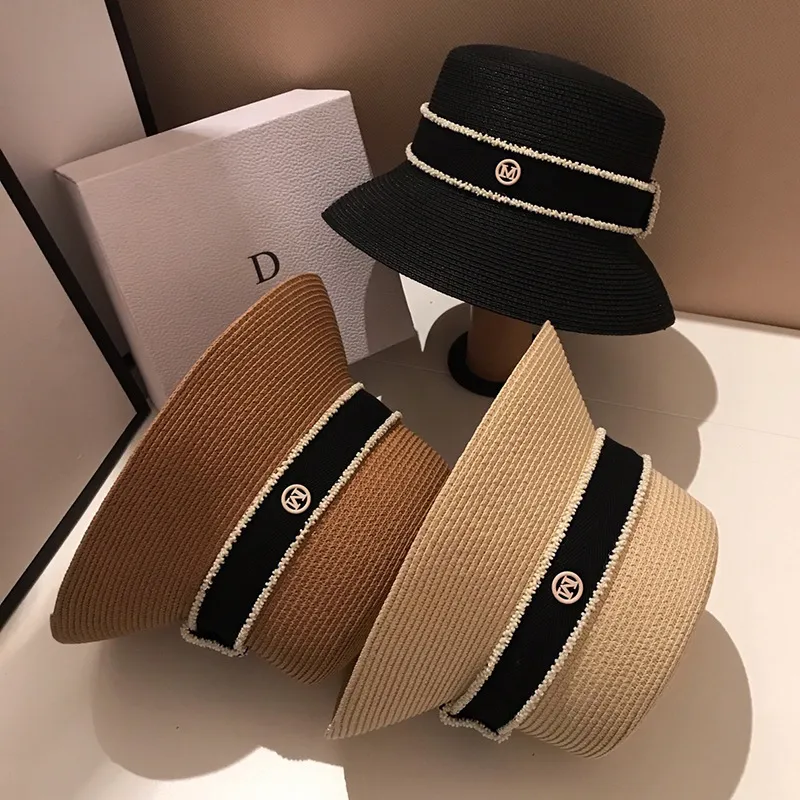 Gorąca sprzedaż Gorąca sprzedaż Nowe letnie słomkowe kapelusze przeciwsłoneczne dla kobiet Moda damska Płaskie rondo Wstążka Plażowa Czapka podróżna Chapeau Femme Kapelusz typu Bucket_voghion.com