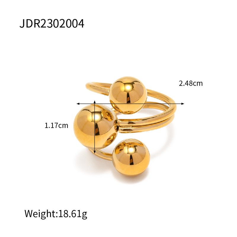 Bague ouverte exagérée à trois sphères en acier inoxydable doré incolore 2023 Personnalité de la mode à la mode_voghion.com