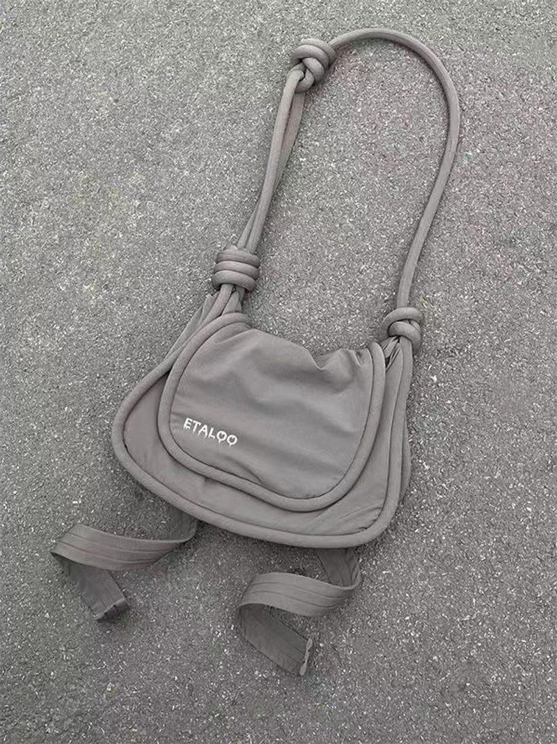 2024 new niche design rope and plastic ribbon fun elastic shoulder crossbody shaped messenger bag_voghion.com