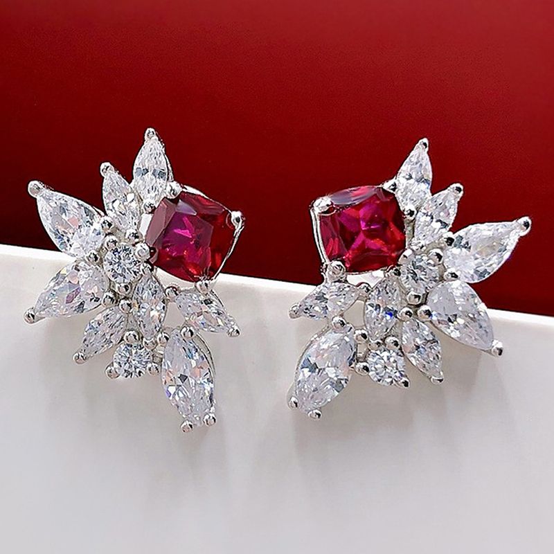 Cao Shi 2022 New Earrings Exquisite Shiny Flower Design Horse Eye Earrings Simple Versatile jacinth Earrings_voghion.com