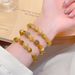 Light Luxury Chinese-Style Charm Bracelet For Women - Yellow Crystal & Golden Tiger Stone Beads With Hollow Ball Design_voghion.com