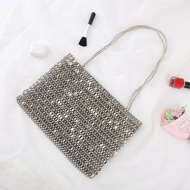 Borsa a mano in metallo lucido con perline intrecciate a mano, piccola borsa_voghion.com
