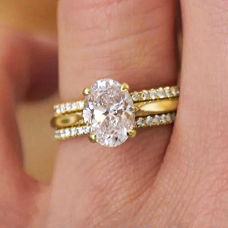 Anello intarsiato a quattro artigli di Cao Shi, tre set di gioielli di design di lusso, anello ellittico in zircone per donna_voghion.com