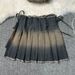 Minigonna stile hot girl da donna design monopezzo lavato a pieghe sbavate a mezza lunghezza_voghion.com
