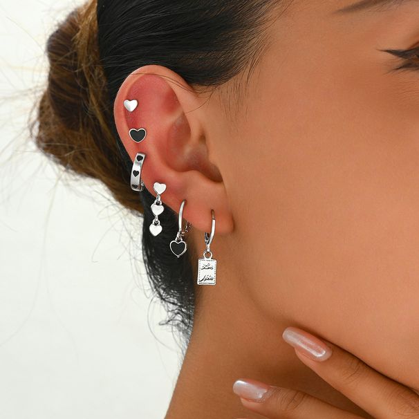 Boucles d'oreilles pour femmes de style universitaire minimaliste noir avec un design d'amour de niche et d'huile dégoulinante, boucles d'oreilles haut de gamme, boucles d'oreilles polyvalentes_voghion.com