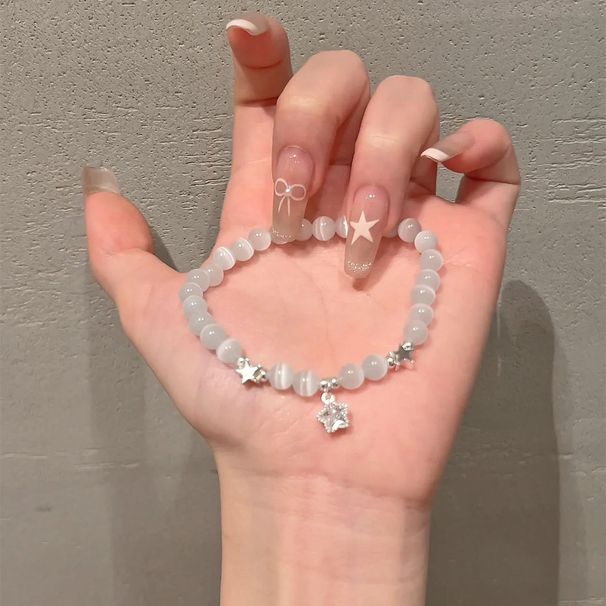 Bracciale da donna in argento puro con pietra occhio di gatto a forma di stella, dal design ricercato e dal temperamento raffinato. Un'amica squisita._voghion.com
