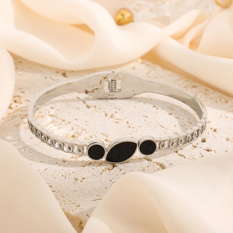 Bracciale geometrico in acciaio al titanio - Stile etnico retrò (gioiello versatile da donna)_voghion.com