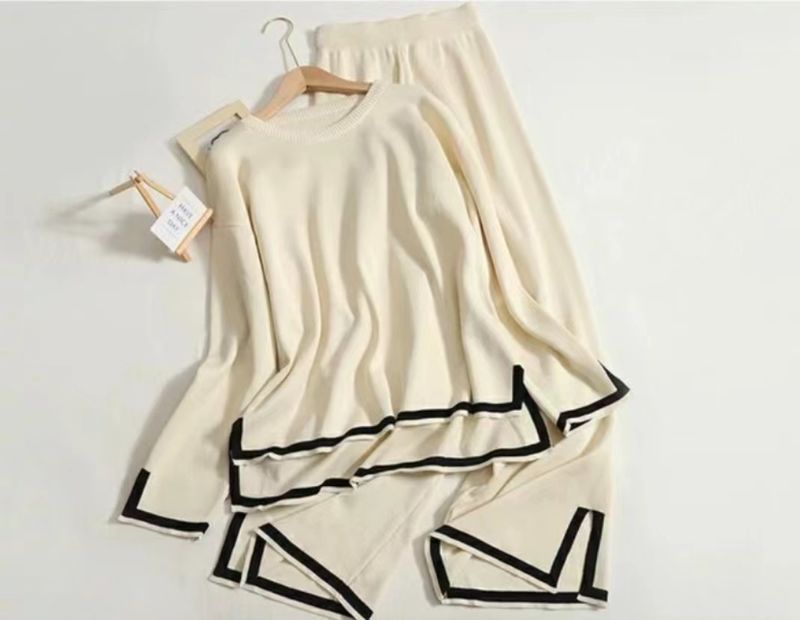 Lässiges Damen-Temperament, Kontrastfarbe, geschlitzter Langarmpullover, schlankmachende Hose mit weitem Bein und hoher Taille, zweiteiliger Anzug_voghion.com