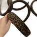 Fascia per capelli in velluto con stampa leopardata, elegante e versatile, autunno/inverno 2025_voghion.com