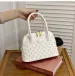 Fashion Designer Shell Bags For Women Elegant Rivet Handbag Versatile Large Capacity Shoulder Crossbody Bag_voghion.com