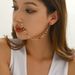 Stile esotico transfrontaliero, colore metallico pendente, temperamento alla moda, personalità, orecchini tutti abbinati, clip per il naso, catena integrata, catena per il naso_voghion.com