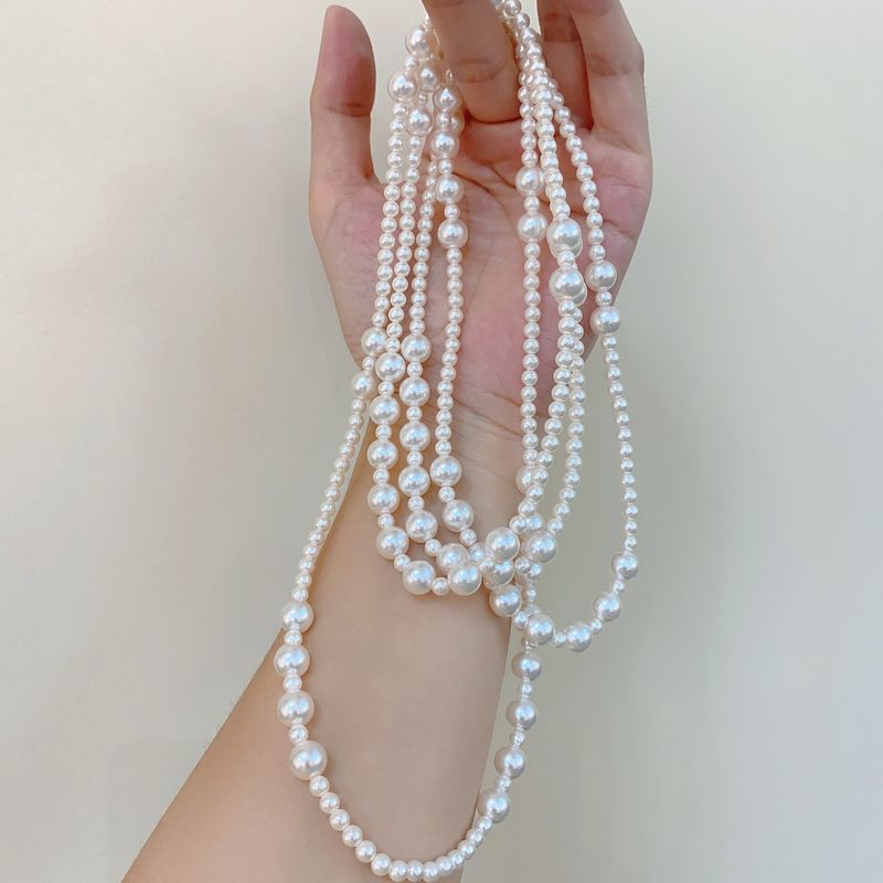 French elegant pearl necklace Korean style trendy multi-layer retro high-end light luxury free shape versatile sweater chain_voghion.com