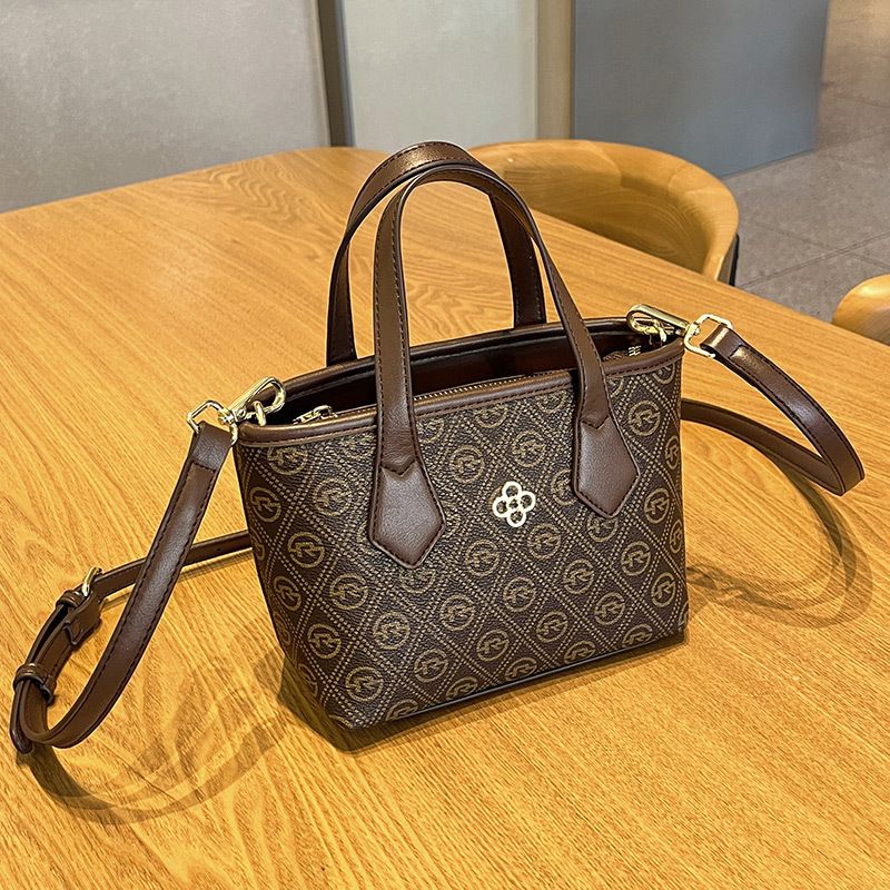 2023 New Bag Handbag Mini Versatile Vegetable Basket Small Bag Light Luxury Retro Print Temperament Tote Bag Tide_voghion.com