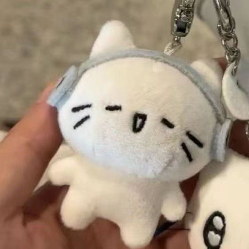 Chaveiro de pelúcia com desenho de gato, fone de ouvido fofo, bolsa de livros, pingente de pelúcia, mesma boneca_voghion.com