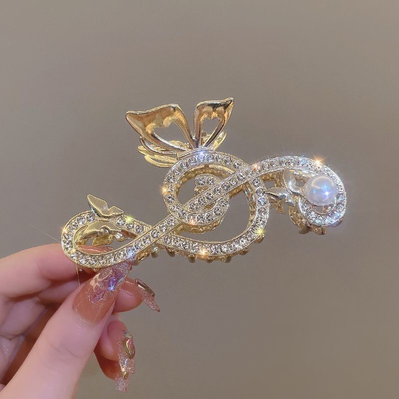 Pinza para el pelo con forma de tiburón para mujer, con nota musical de diamantes de imitación, placa para la parte posterior de la cabeza, ligera, de lujo, con sentido senior_voghion.com