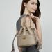 KOSE High-grade First-layer Cowhide Bucket Bag New Genuine Leather Women's Bag Tassel Niche Drawstring Shoulder Messenger Bag_voghion.com
