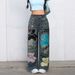 Women's Graffiti Print Wide-Leg Jeans – Streetwear Denim Pants With Artistic Flair (S/M/L/XL/XXL, Relaxed Fit, Mid-Rise, Machine Washable)_voghion.com