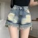 Ragged edge design denim shorts, female internet celebrity Instagram, worn out, niche, and distressed A-line tassels,_voghion.com