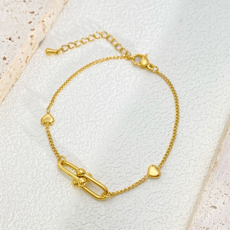 Bracciale versatile in titanio per donna, con fibbia a ferro di cavallo, con cuore e perle, regolabile, in acciaio inossidabile, colore: argento_voghion.com