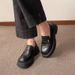 Mocassini slip-on in pelle nera da donna con suola spessa_voghion.com