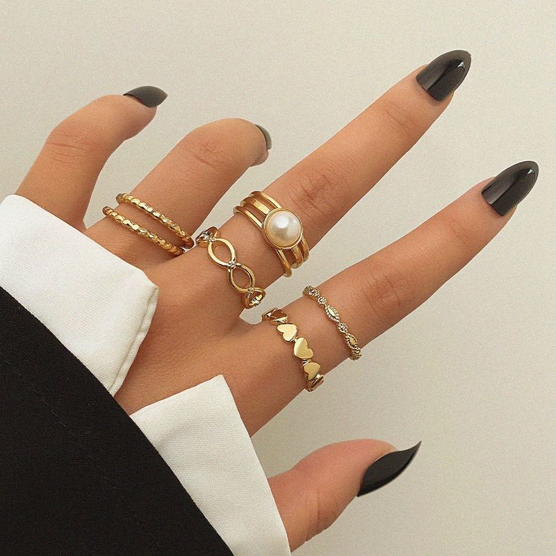 Hot sales Bohe style gold heart-shaped set, retro geometric design, pearl cross, bow, women's artificial ring_voghion.com