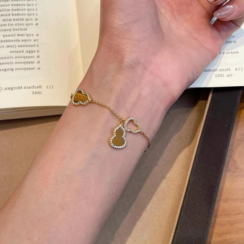 Bracelet gourde œil de tigre « Bonne année » pour femme, nouveau bijou rétro léger et luxueux, simple et polyvalent, pour le printemps et l'été, 2025_voghion.com